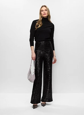Pull à col roulé et pantalon à sequins