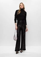 Pull à col roulé et pantalon à sequins