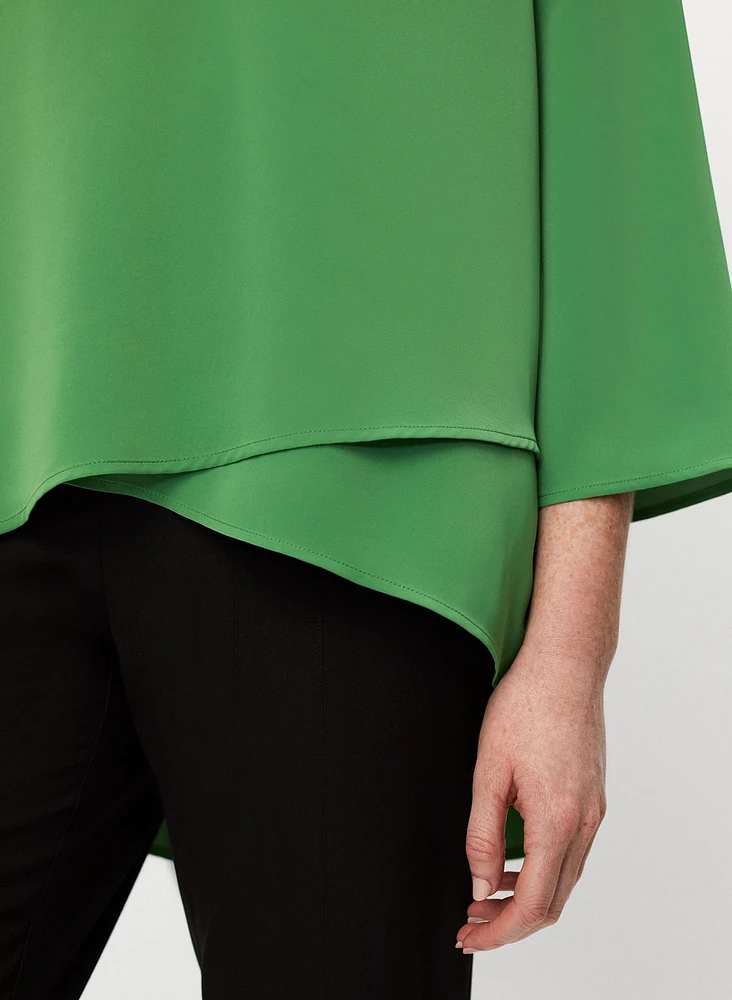 Haut asymétrique à effet superposé
