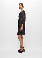 Robe en sequins à manches bouffantes