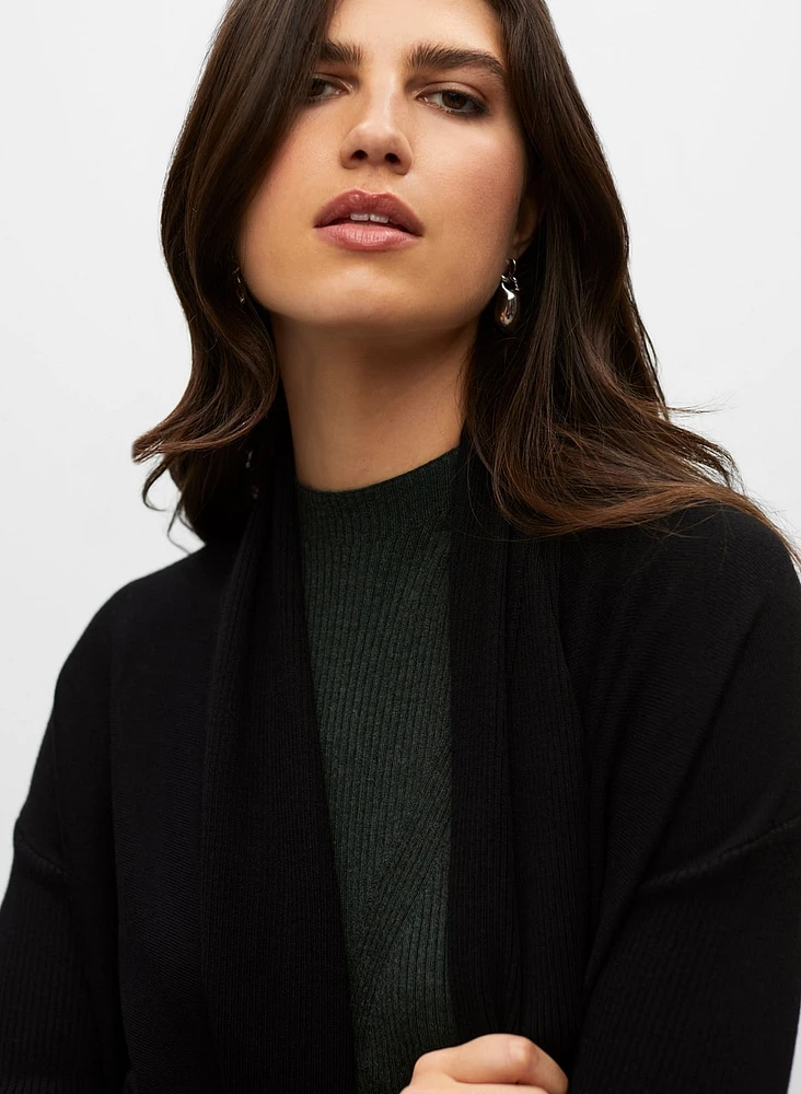 Cardigan à franges et ourlet asymétrique