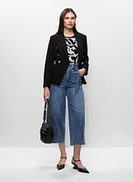 Veste à col tailleur boutonnée et jean jupe-culotte ceinturé