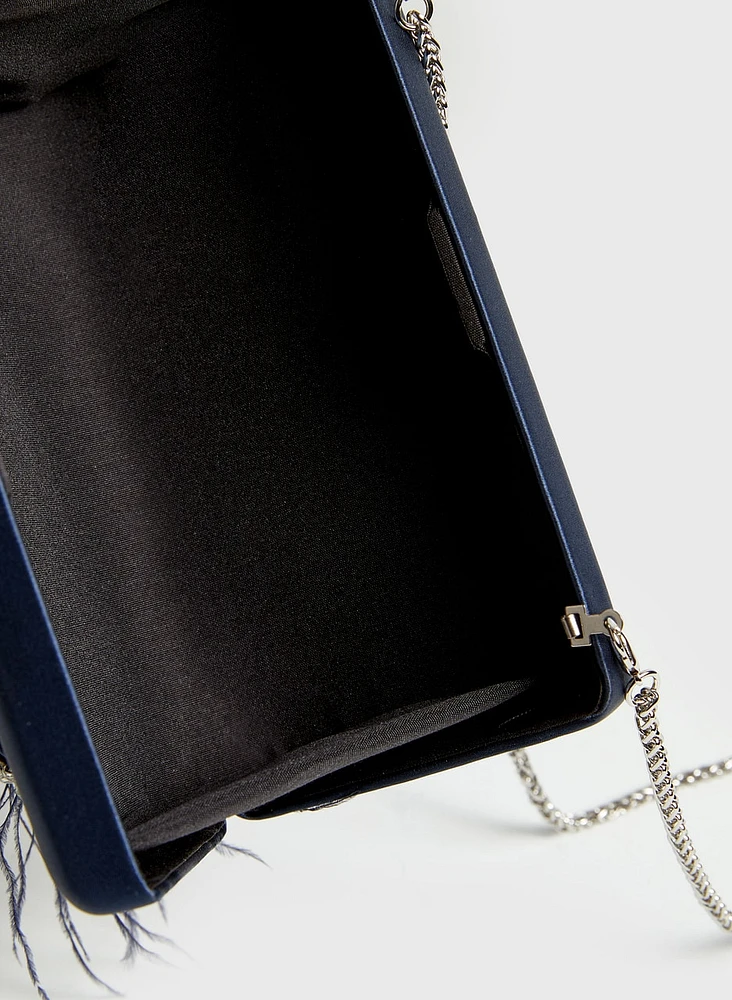 Pochette à sangle avec cristaux et plumes