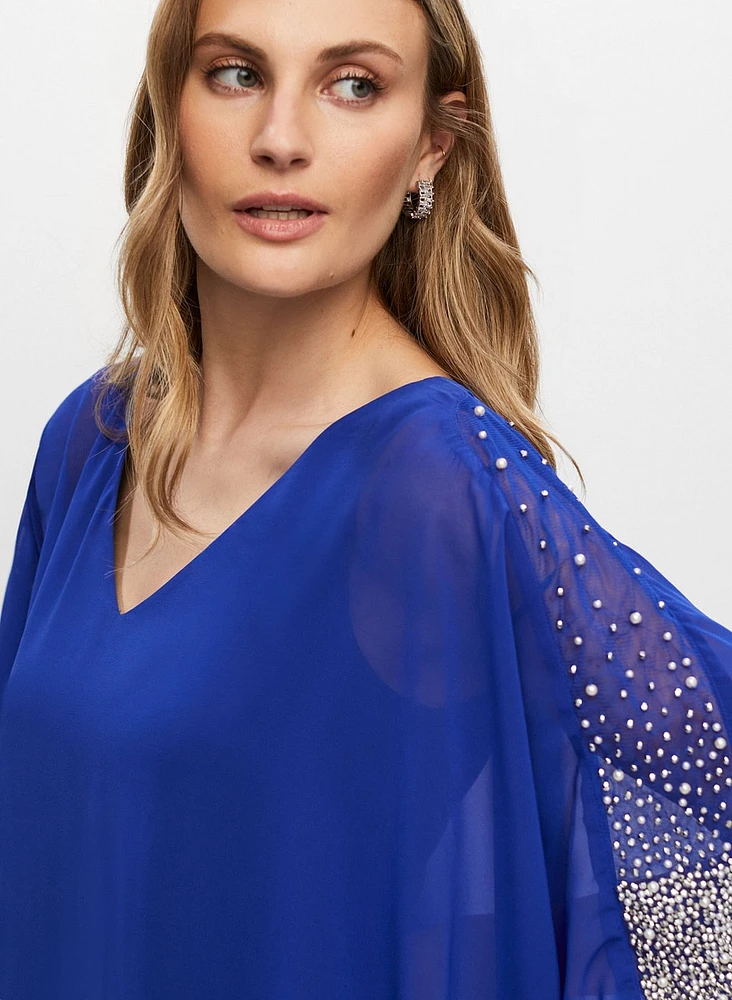 Robe à cape superposée et perles