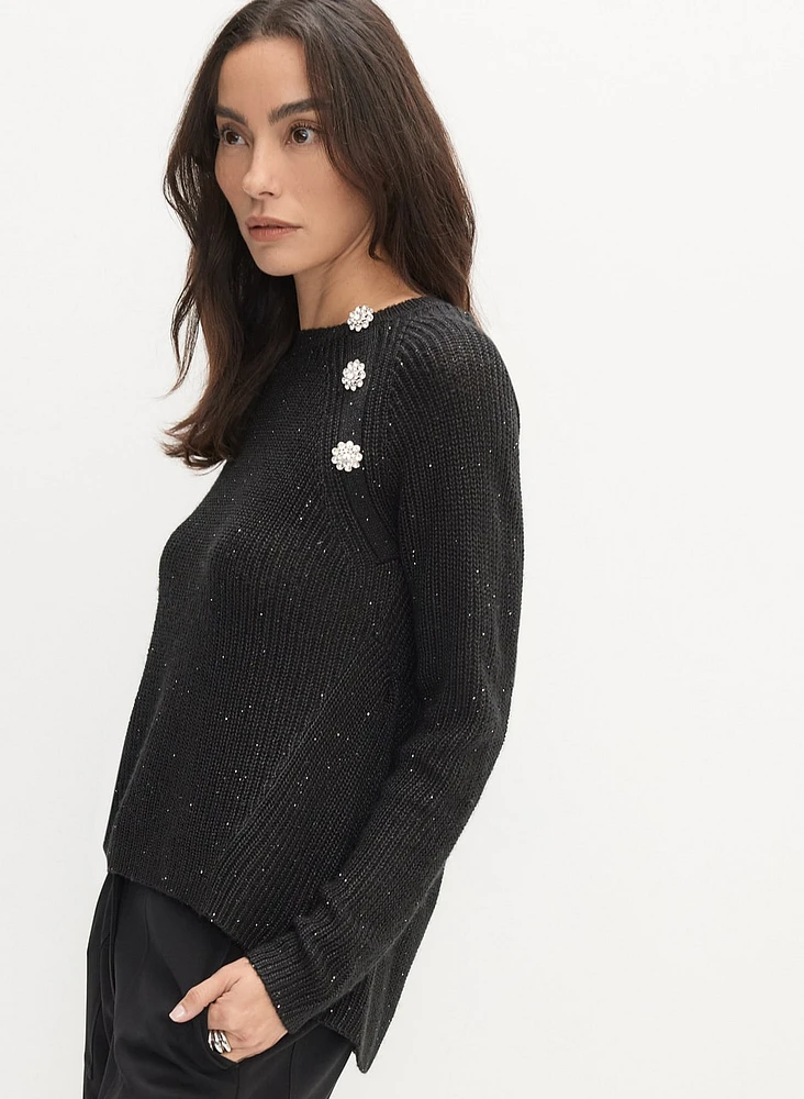 Pull asymétrique à boutons fantaisie