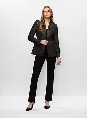 Veste mi-longue et jean brodé