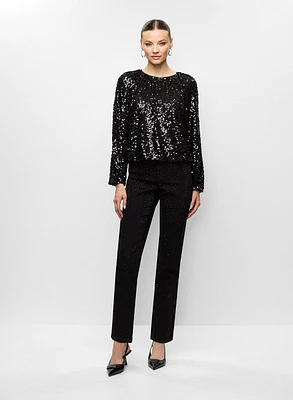 Haut en sequins et jean droit