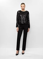 Haut en sequins et jean droit