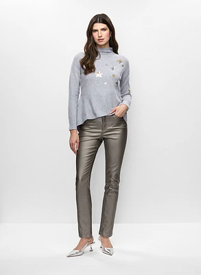 Pull à étoiles et jean effet cuir