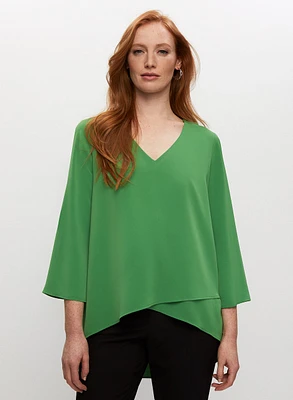 Haut asymétrique à effet superposé