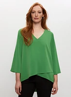 Haut asymétrique à effet superposé