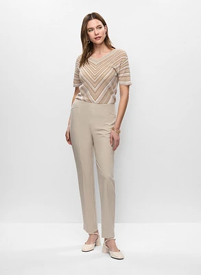 Pull à rayures et pantalon droit
