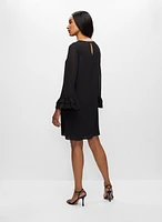 Robe à manches cloche et volants