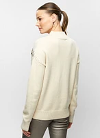 Pull à col montant et épaules pailletées
