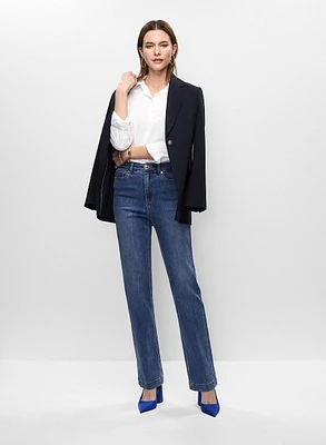 Veste mi-longue et jean semi-évasé