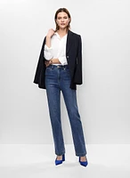 Veste mi-longue et jean semi-évasé
