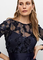 Robe longue en maille et jupe satin