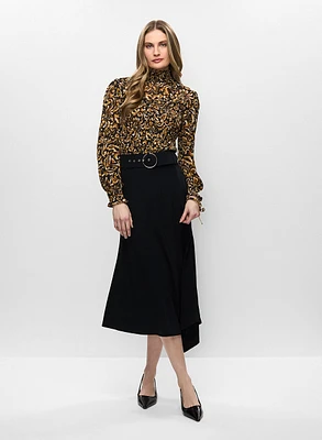 Haut smocké et jupe asymétrique