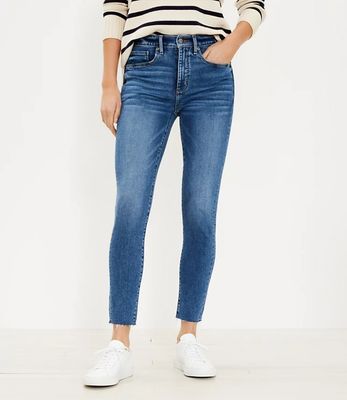 Mid Rise Skinny Jeans in Mid Indigo Wash | LOFT