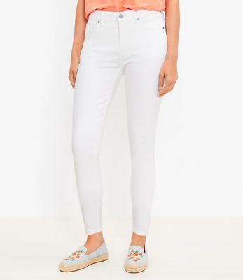 Petite Curvy Mid Rise Skinny Jeans in White | LOFT