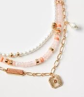 Pearlized Layered Charm Statement Necklace