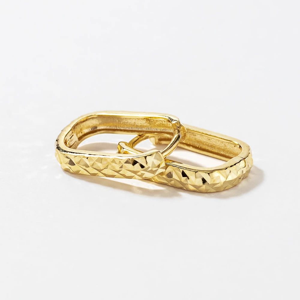 Diamond Cut Oval Huggie Earrings in 10K Yellow Gold