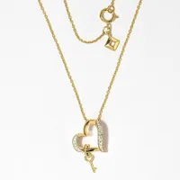 Heart and Key Diamond Pendant in 10K Yellow Gold (0.05 ct tw)