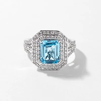 Blue Topaz Ring with Diamond Accents 10K White Gold