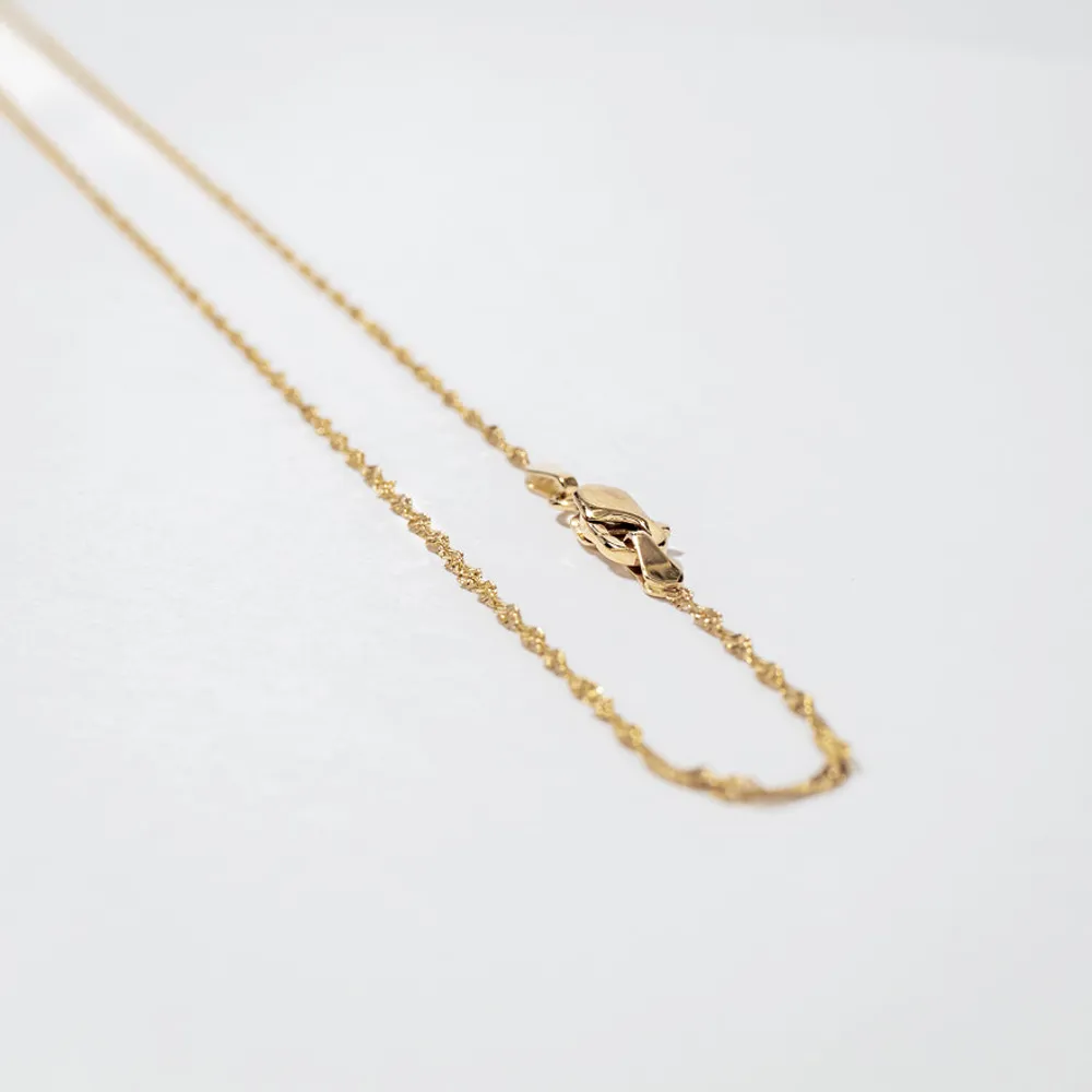 14K Yellow Gold 1.15mm Diamond Cut Singapore Chain (16")