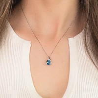 Diamond and Blue Topaz Pendant in 10K White Gold