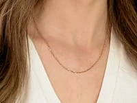 1.6mm Round High Polished Cable Chain in 10K White and Yellow Gold (18