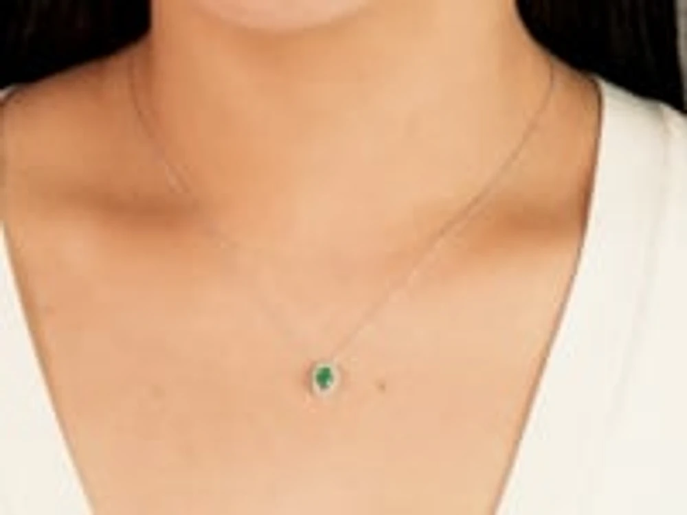 Oval Emerald and Diamond Halo Necklace in 10K White Gold (0.12ct tw)