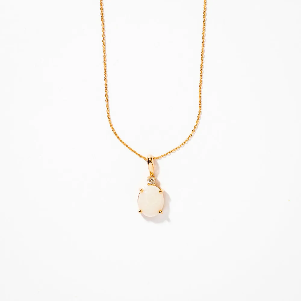 Oval Opal Pendant With Diamond Accent Crafted In 10K Yellow Gold