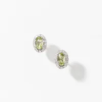 Oval Peridot and Diamond Halo Earrings in 14K Yellow Gold