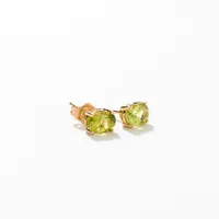 Peridot Four Claw Stud Earrings in 14K Yellow Gold