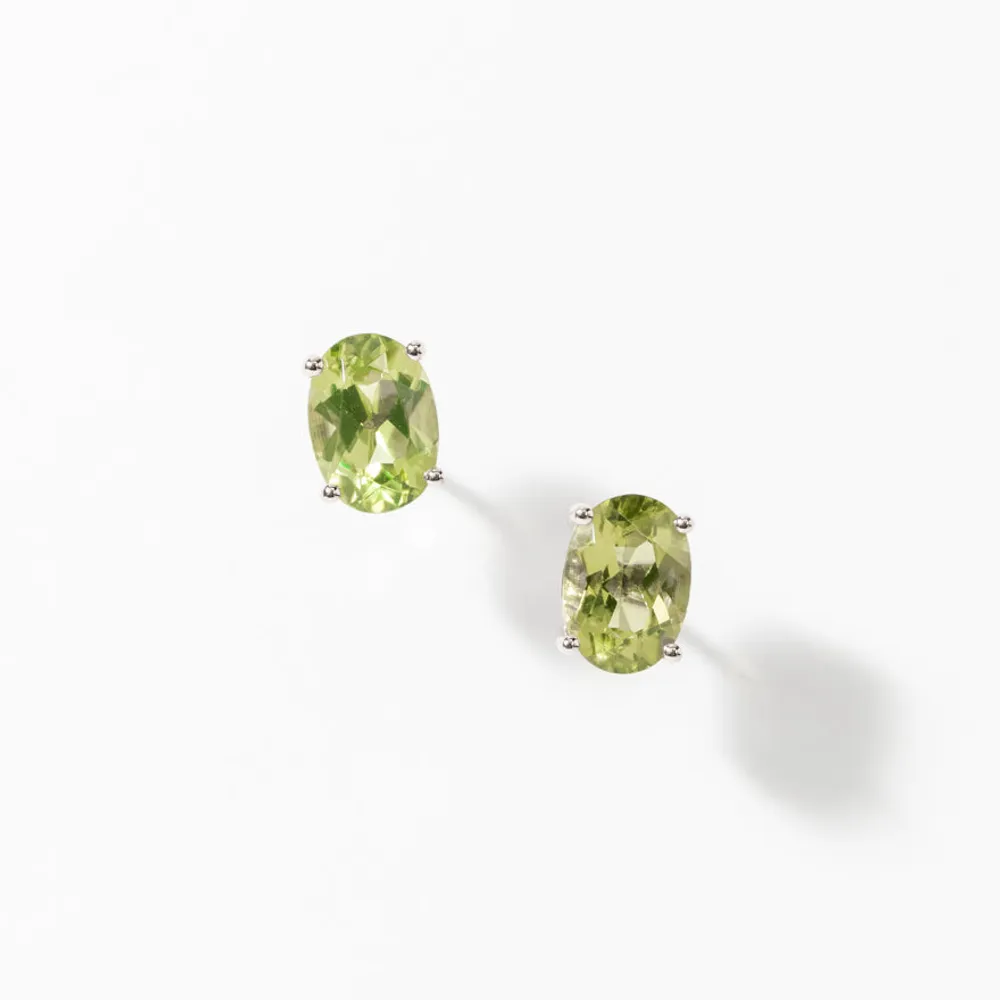 Peridot Four Claw Stud Earrings in 14K Yellow Gold