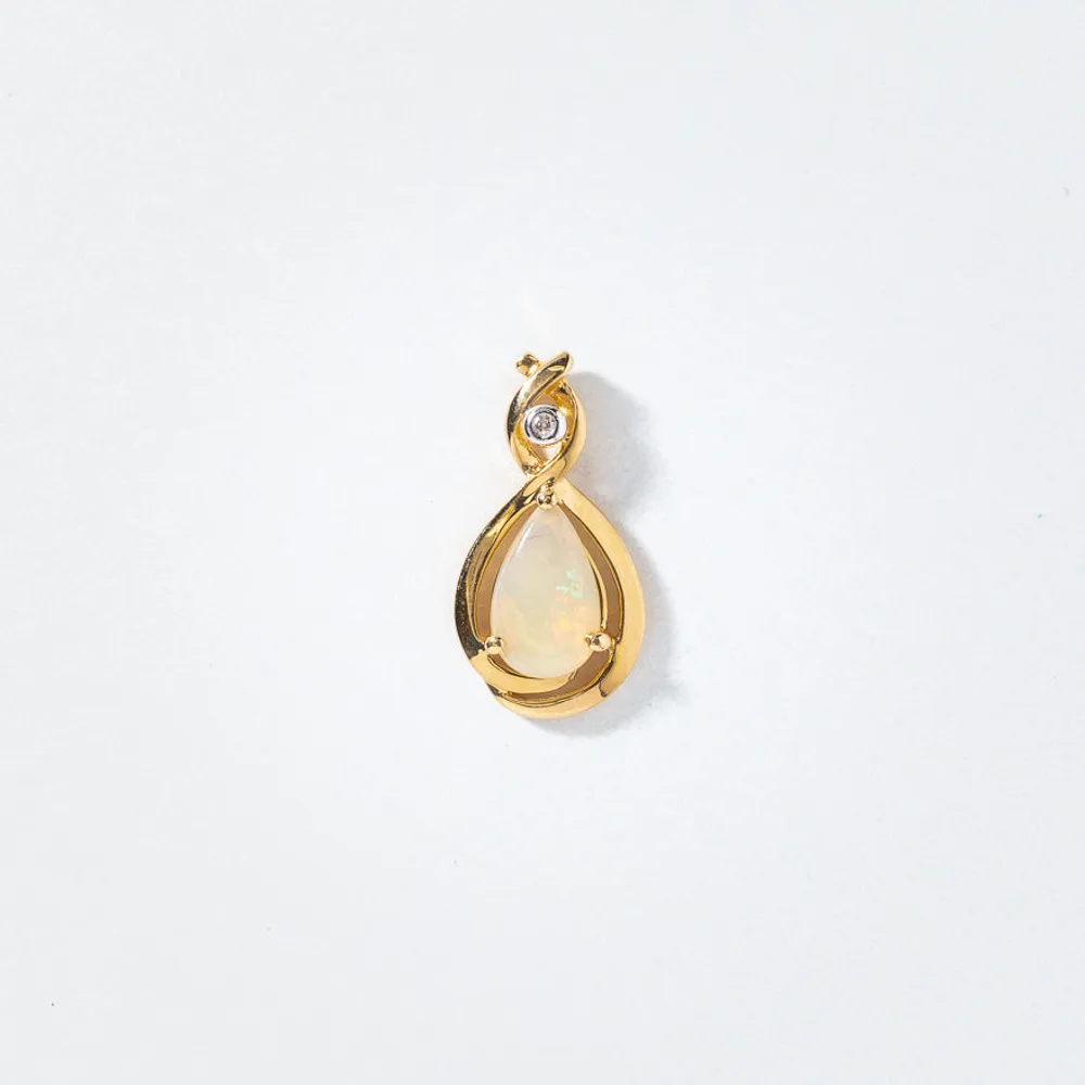 Opal Pendant With Diamond Accent in 14K Yellow Gold