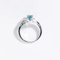 Oval Blue Topaz Ring With Diamond Accents 10K White Gold