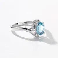 Oval Blue Topaz Ring With Diamond Accents 10K White Gold