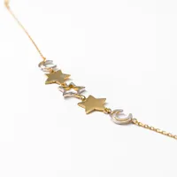 Star and Moon Bracelet in 10K Yellow and White Gold