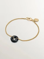 Pulsera de plata 925 bañada en oro amarillo de 18K con ónix negro