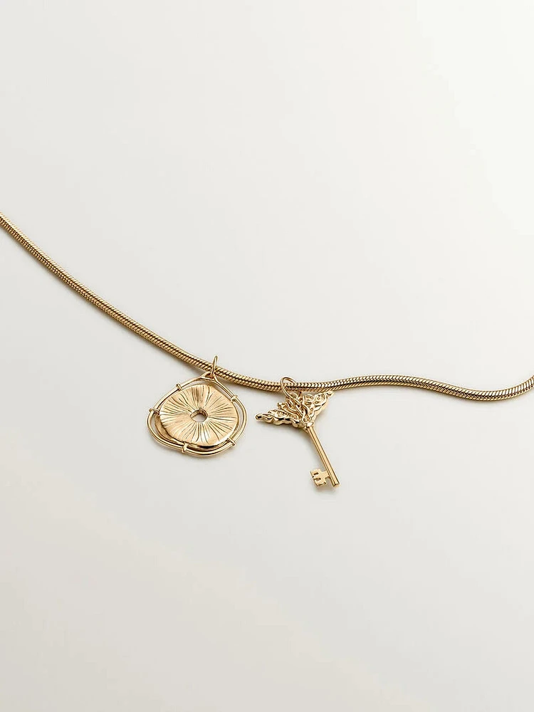 CHARM LLAVE DE PLATA BAÑADA EN ORO AMARILLO DE 18KT