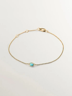 Pulsera de oro amarillo de 18K con ópalos turquesas y diamantes