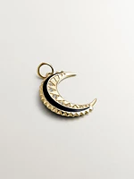 Charm de plata 925 bañada en oro amarillo de 18K con topacios blancos, esmalte negro y forma de luna