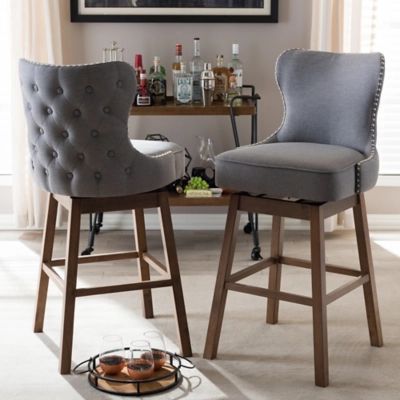 Baxton Studio Baxton Studio Gradisca Modern and Contemporary Brown Wood Finishing and Grey Fabric Button-Tufted Upholstered Swivel Barstool