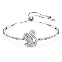 Swan bangle, Swan, White, Rhodium plated by SWAROVSKI