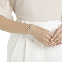 Hollow bracelet, Interlocking loop, White, Rhodium plated by SWAROVSKI