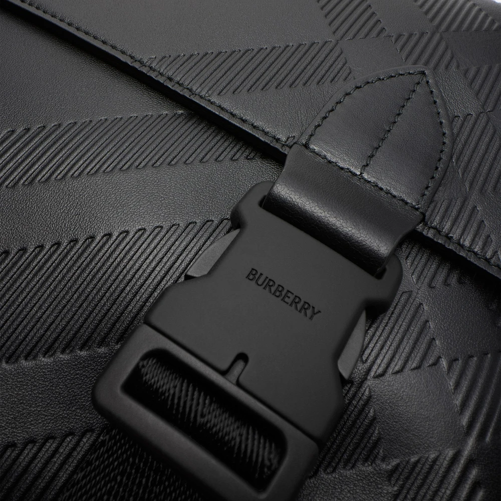 Embossed Check Buckled Messenger Bag​ in Black - Men, Leather | Burberry® Official