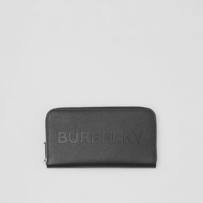 Logo Embossed Leather Ziparound Wallet in Black - Men | Burberry® Official