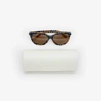 Tubular Check Round Sunglasses in Light sand - Women | Burberry® Official